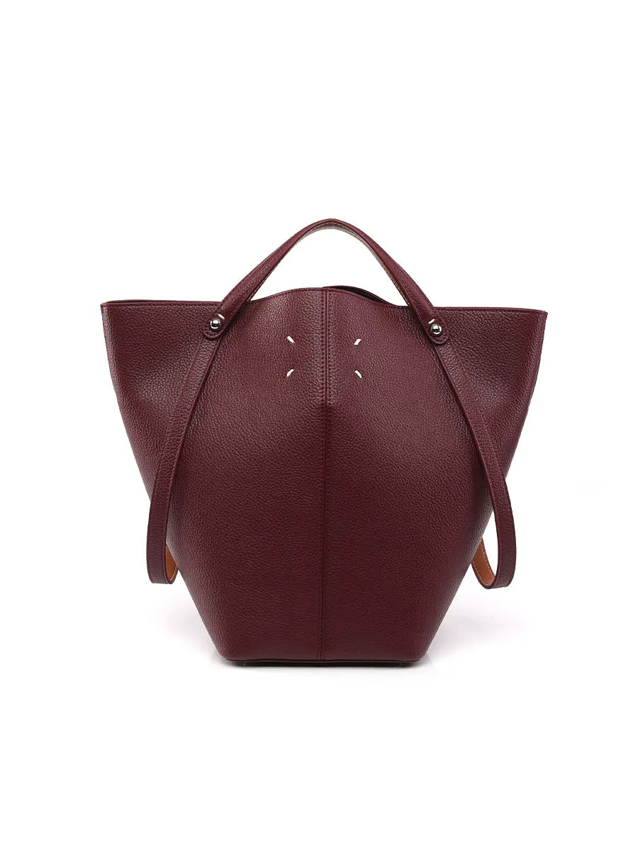 Maroon handbag on a white background
