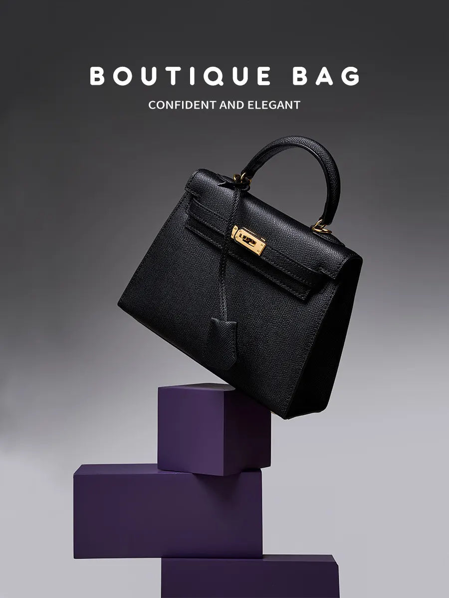 Black boutique bag on purple cubes with 'Boutique Bag' text above