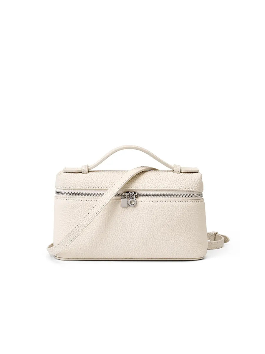 Beige crossbody bag on a white background