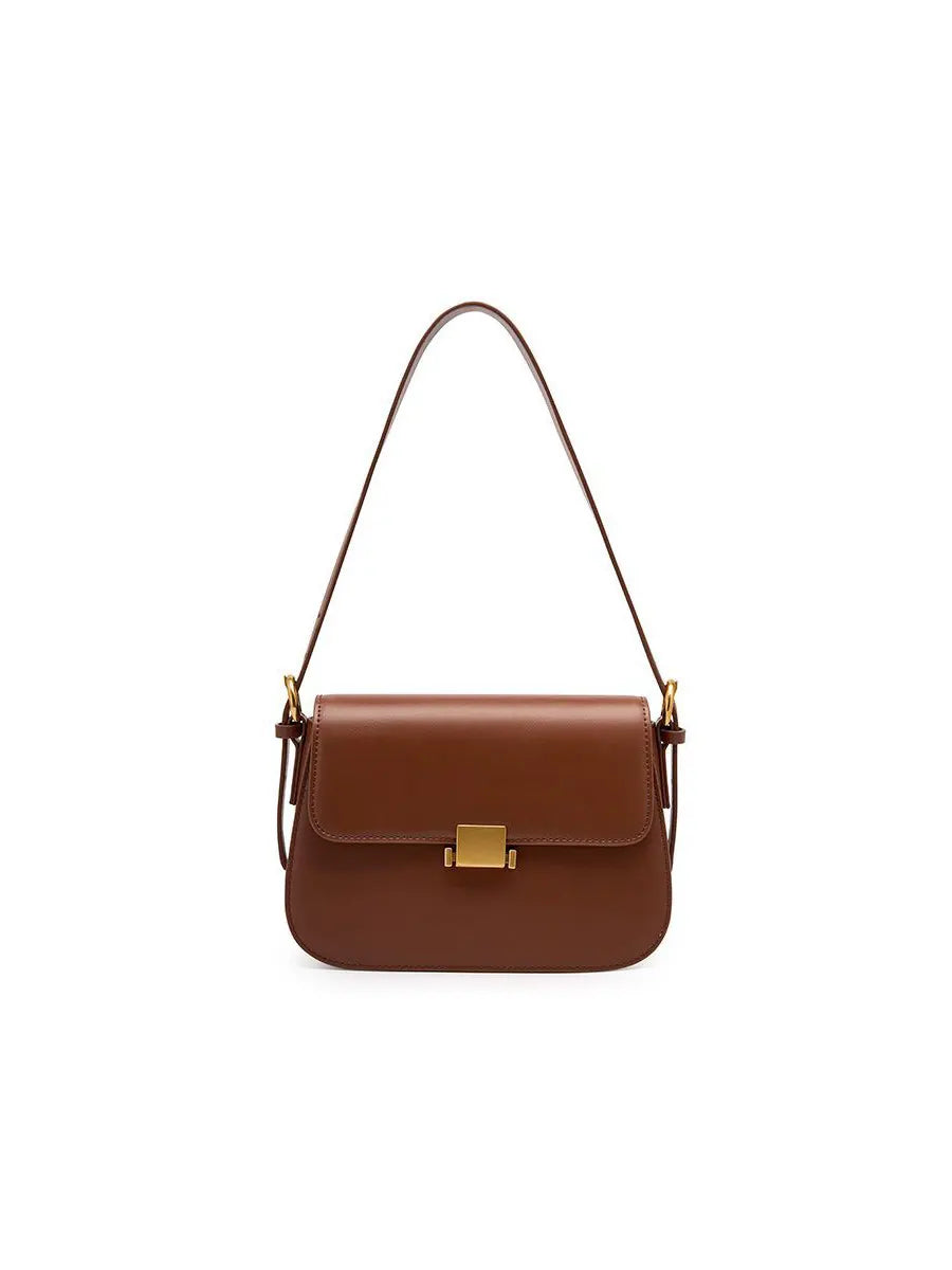Brown handbag with a gold clasp on a white background