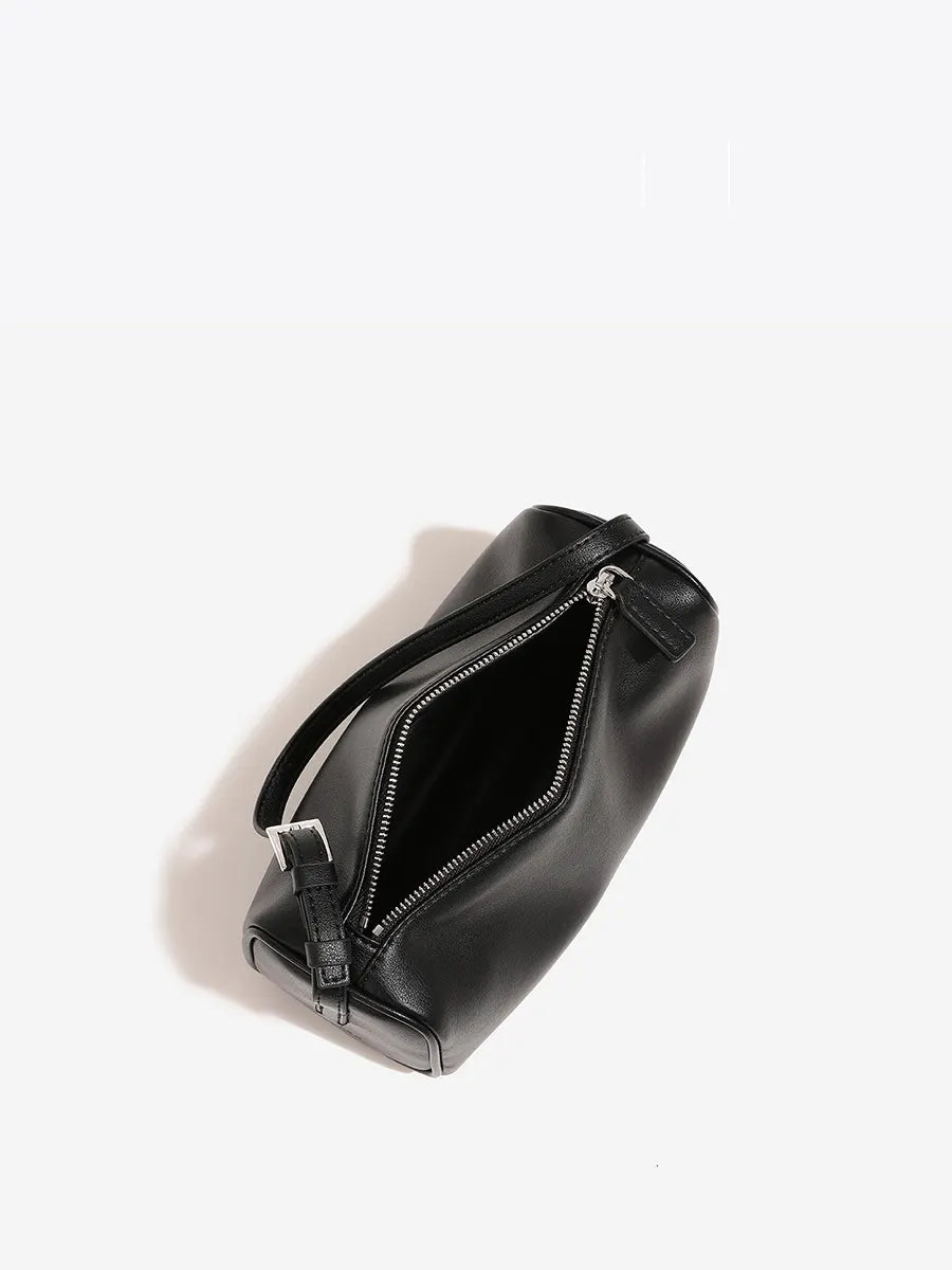 Black leather bag with a zipper on a white background