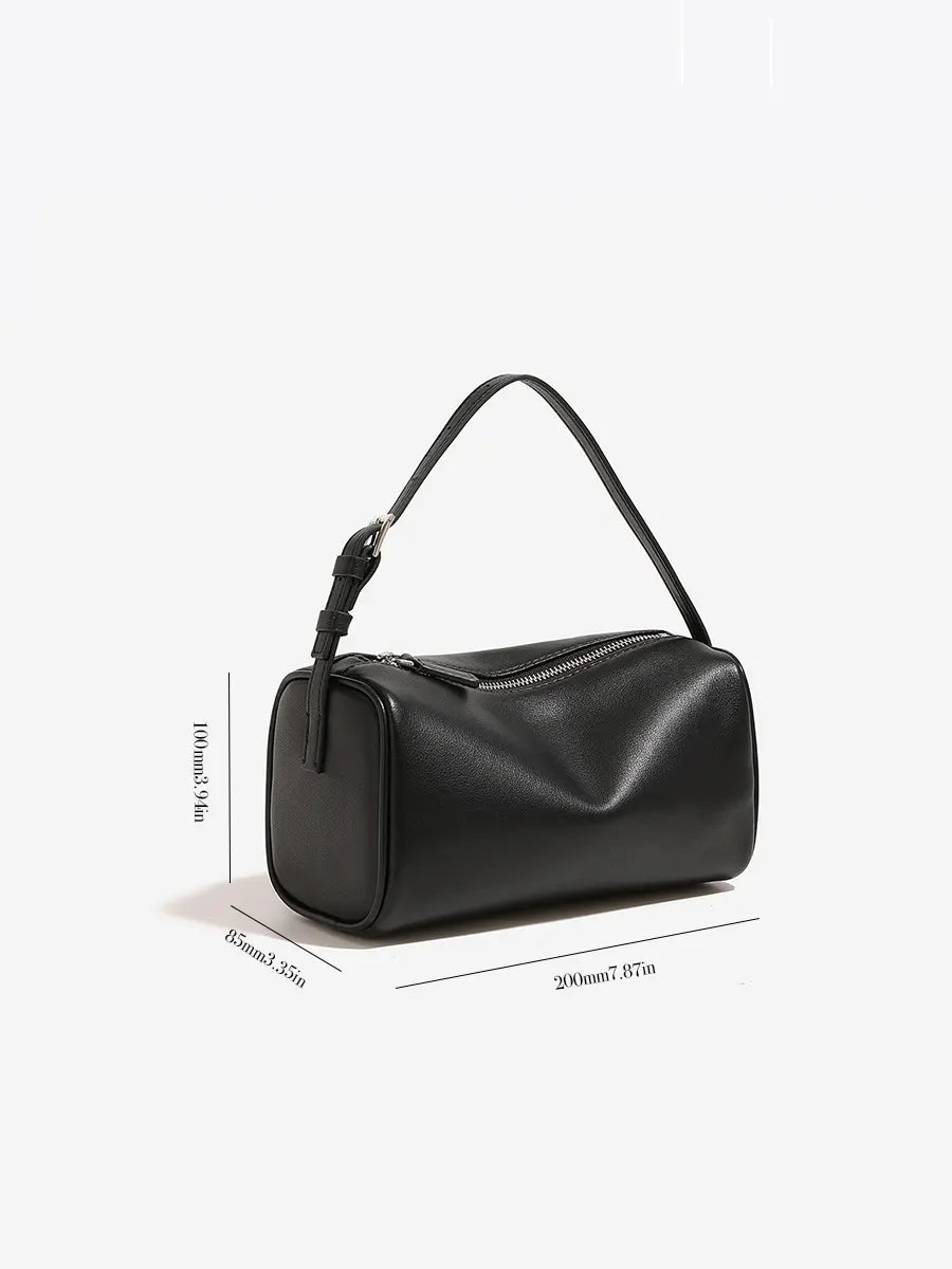 A black leather shoulder bag with a cylindrical barrel shape, displayed on a clean white background with dimension lines indicating its measurements of 20cm x 8.5cm x 10cm.
