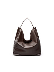 Brown leather handbag on a white background