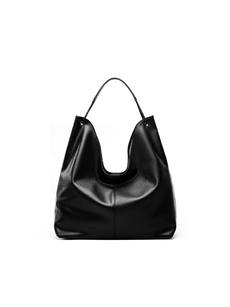 Black handbag on a white background