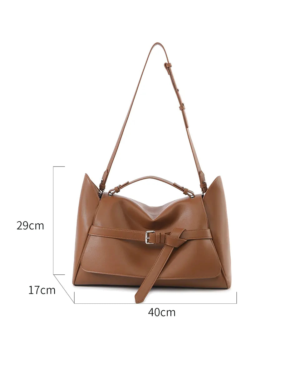 Brown handbag with measurements on a white background