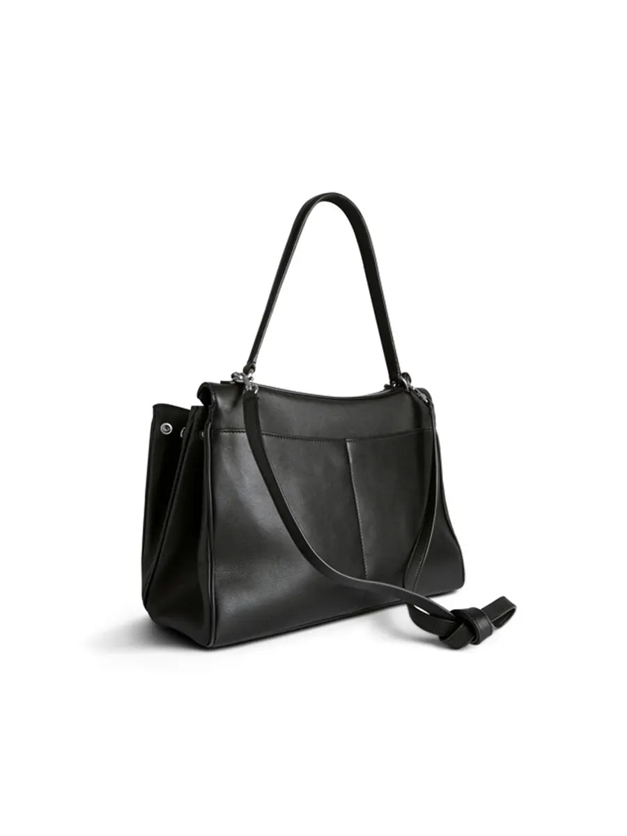 Black handbag on a white background