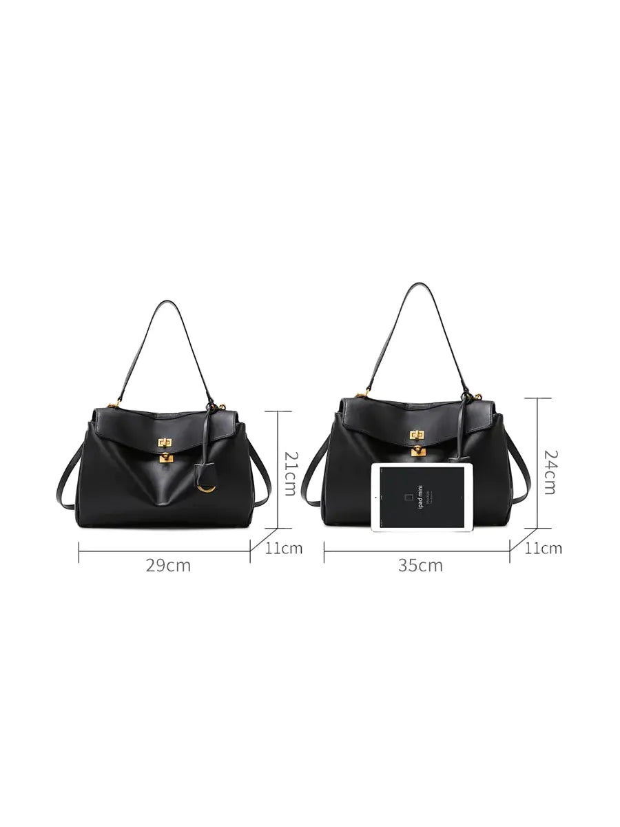 Black handbag with dimensions indicated on a white background