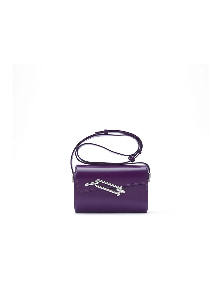 Purple handbag with a silver clasp on a white background