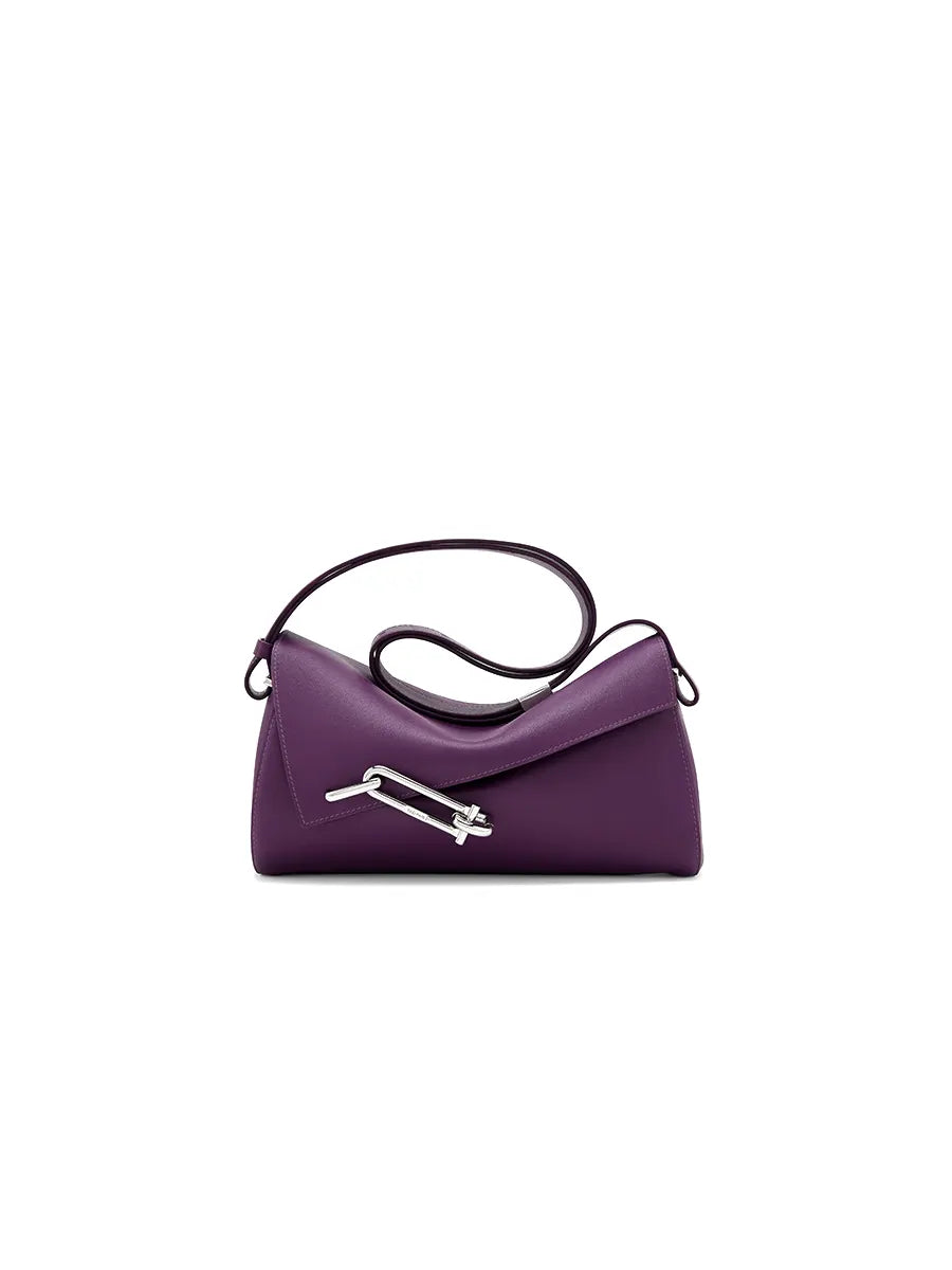 Purple handbag with a black handle on a white background