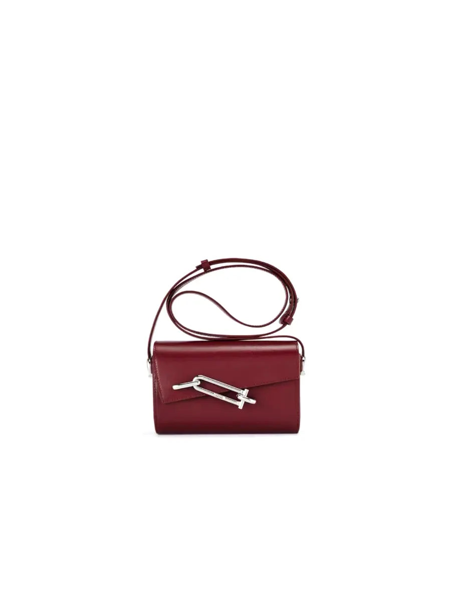 Red handbag with a silver clasp on a white background