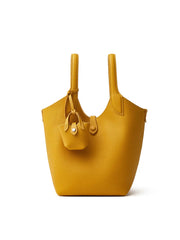 Yellow handbag with a smaller matching pouch on a white background