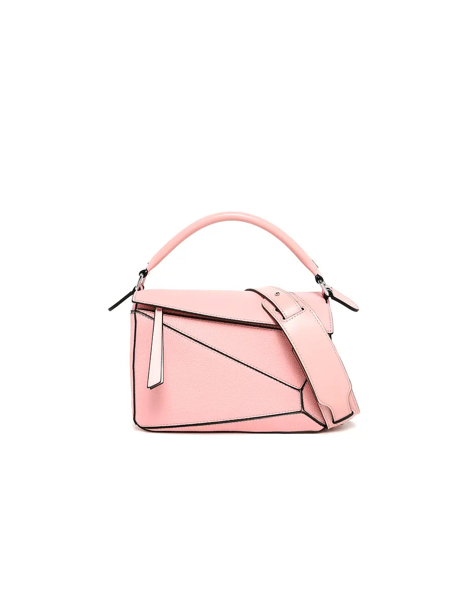Pink handbag on a white background