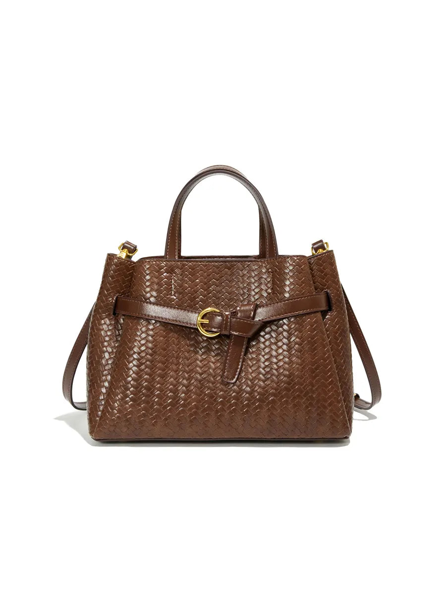 Brown woven handbag with a strap on a white background