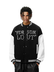 Person wearing a black and white varsity jacket with text on a white background