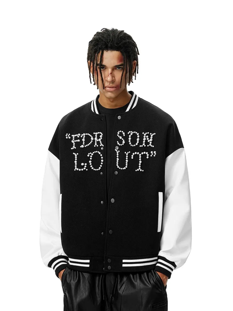 Person wearing a black and white varsity jacket with text on a white background