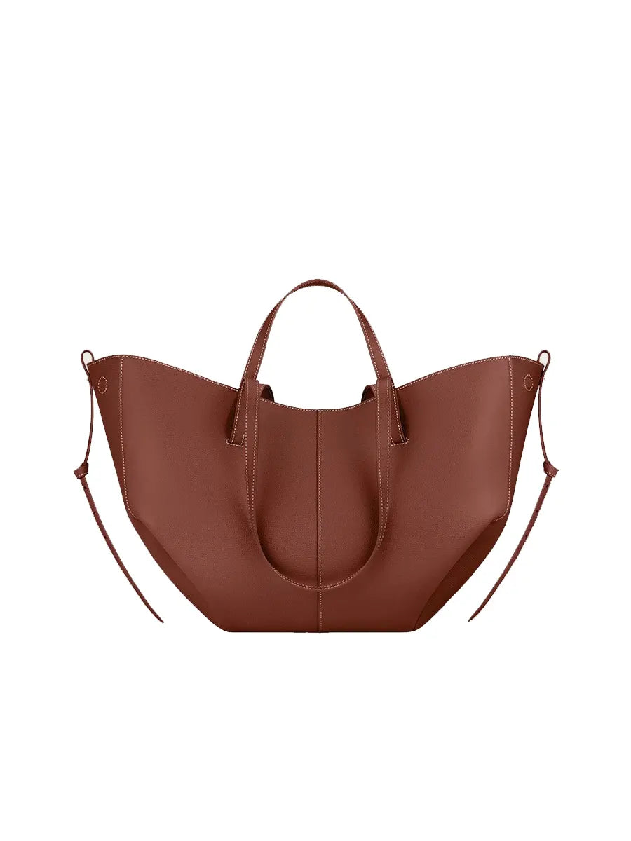 Brown leather tote bag on a white background