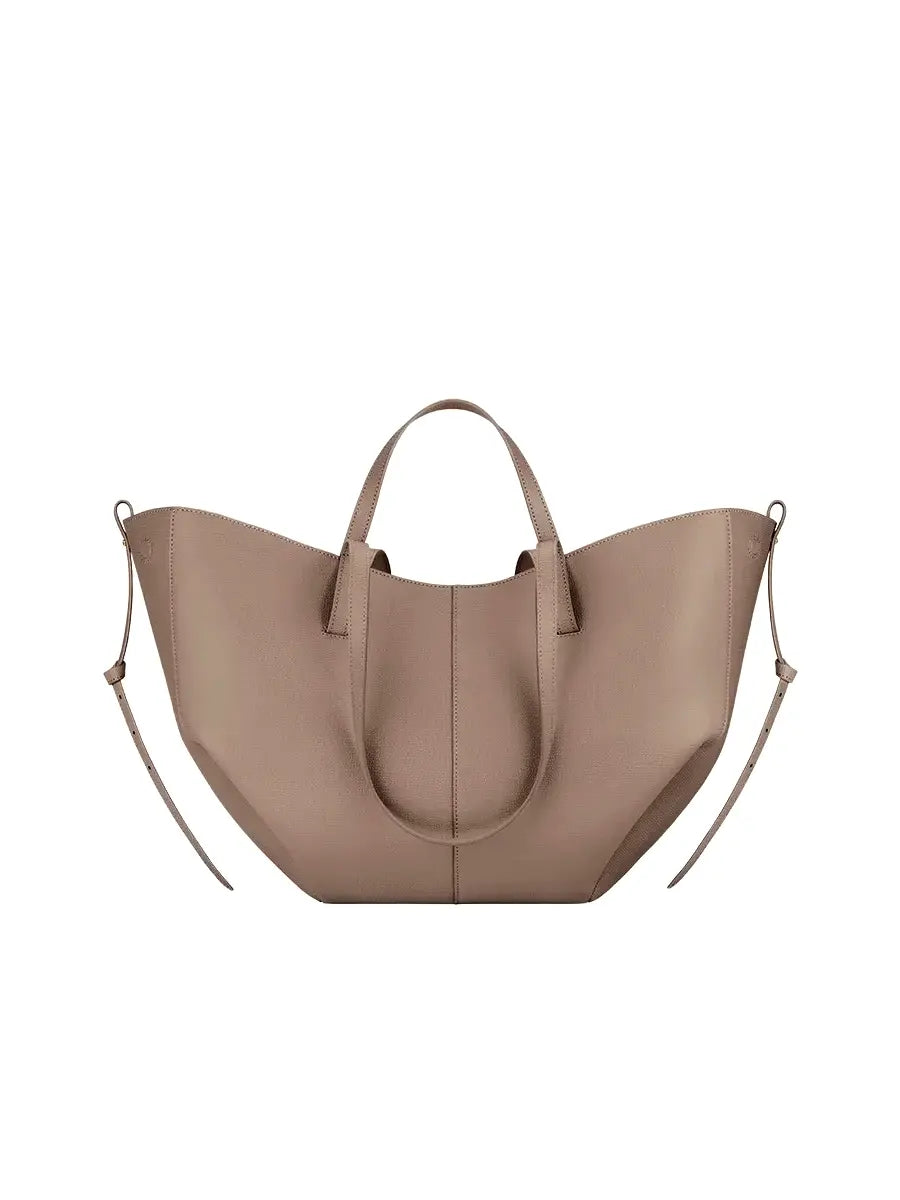 Beige tote bag with shoulder straps on a white background