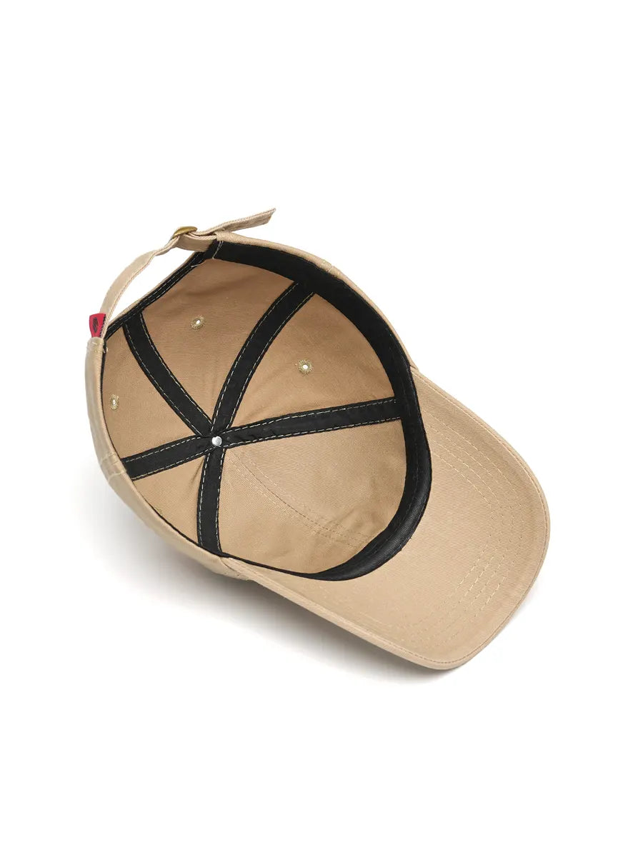 Beige cap with black interior on a white background