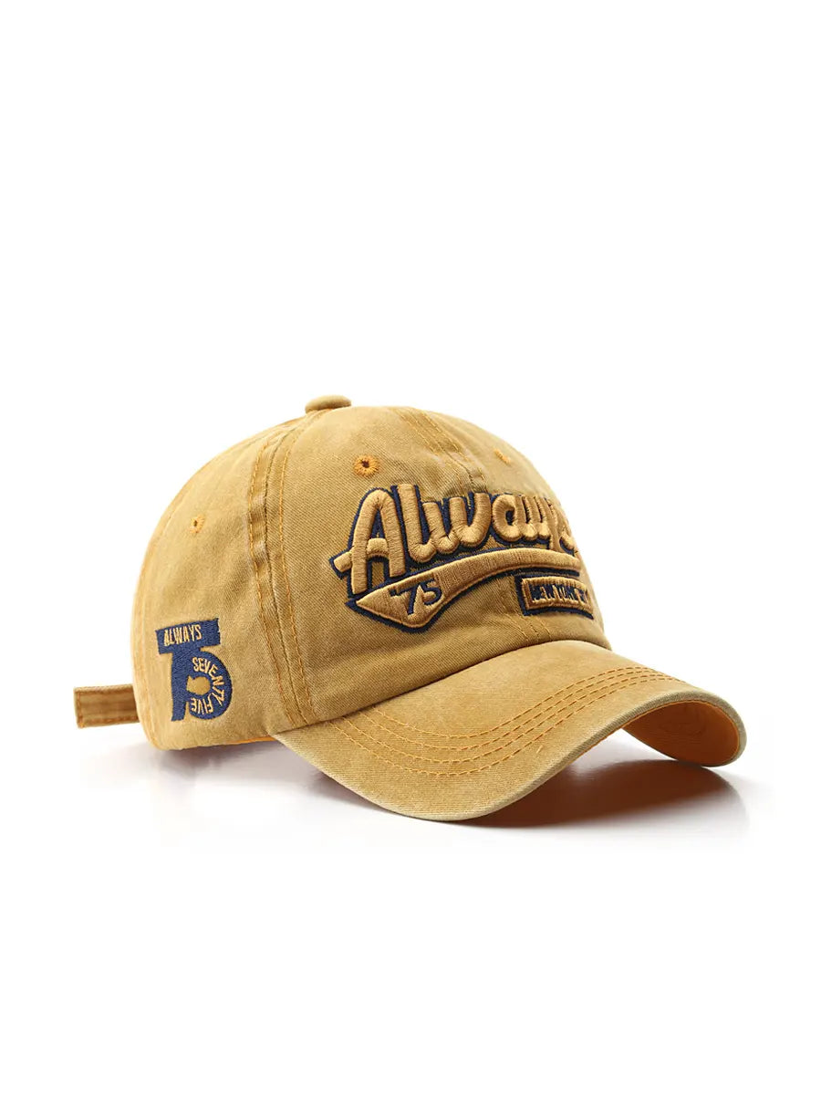 Beige cap with 'Always' and '75' logo on a white background