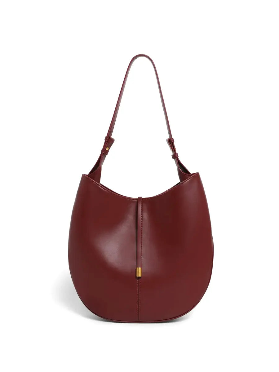 Maroon handbag with a gold clasp on a white background