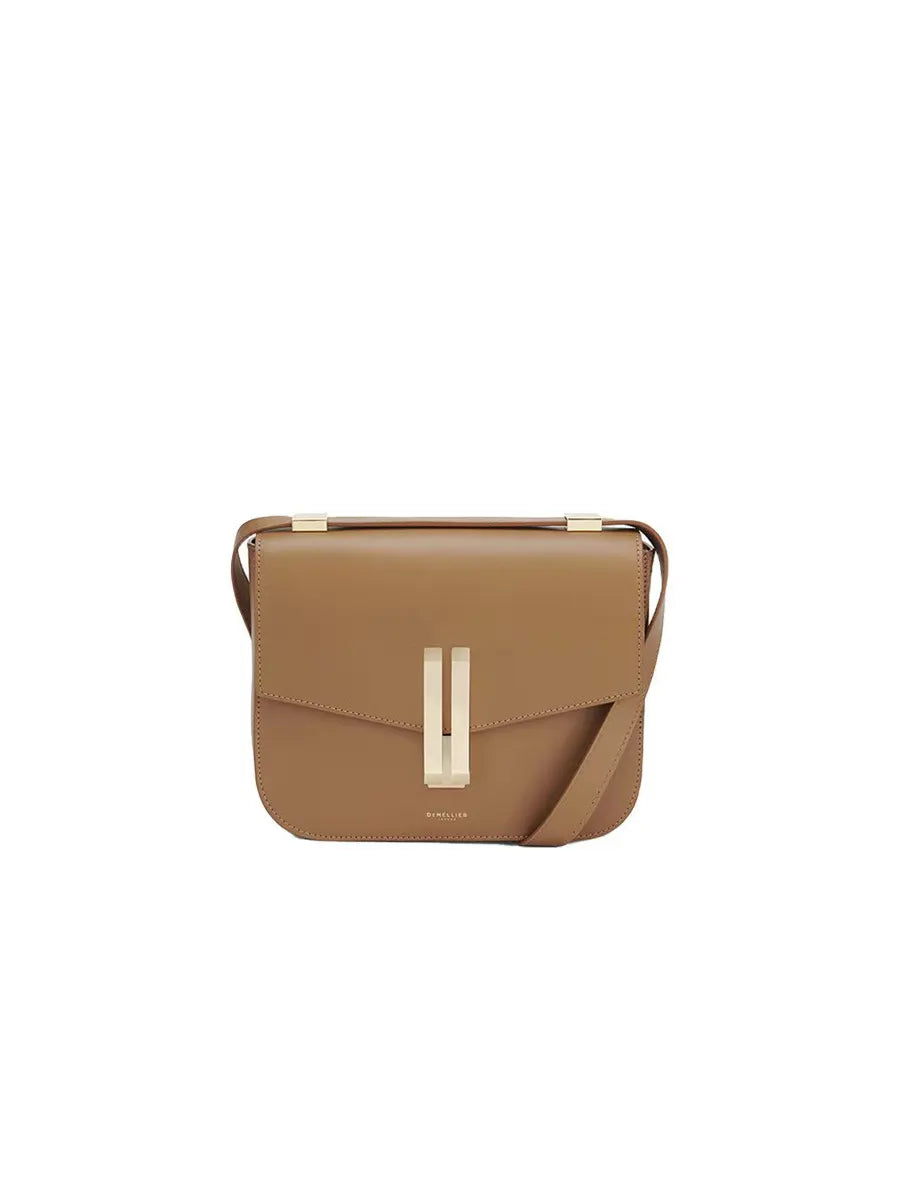 Brown handbag with a gold clasp on a white background