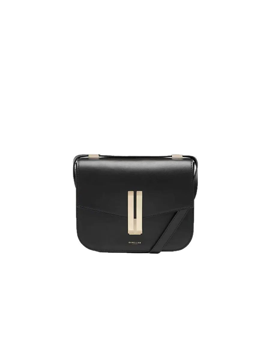 Black handbag with a gold clasp on a white background