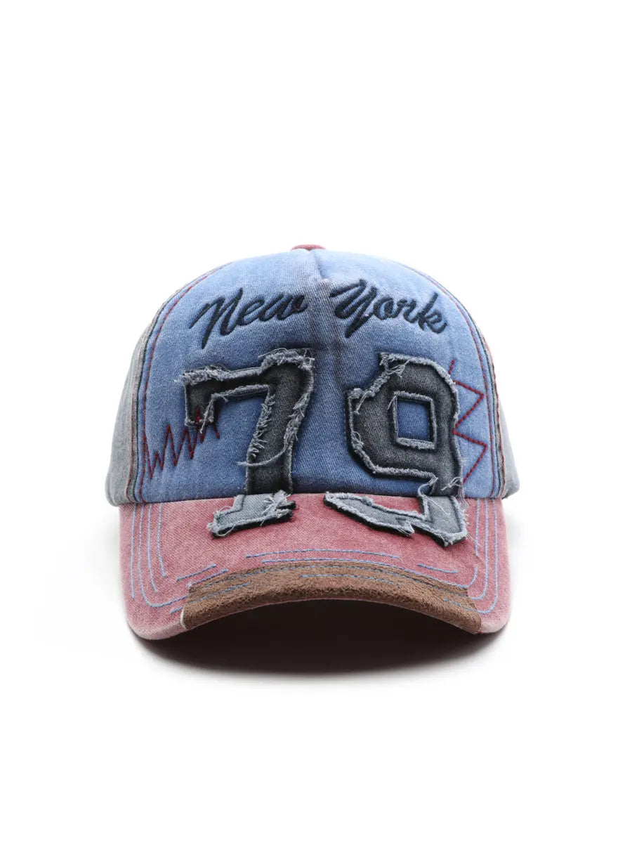 Vintage-style baseball cap with 'New York' and number '79' on a white background