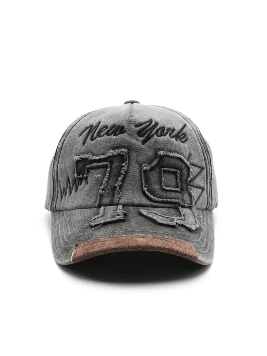 Gray cap with 'New York' and number '70' on a white background