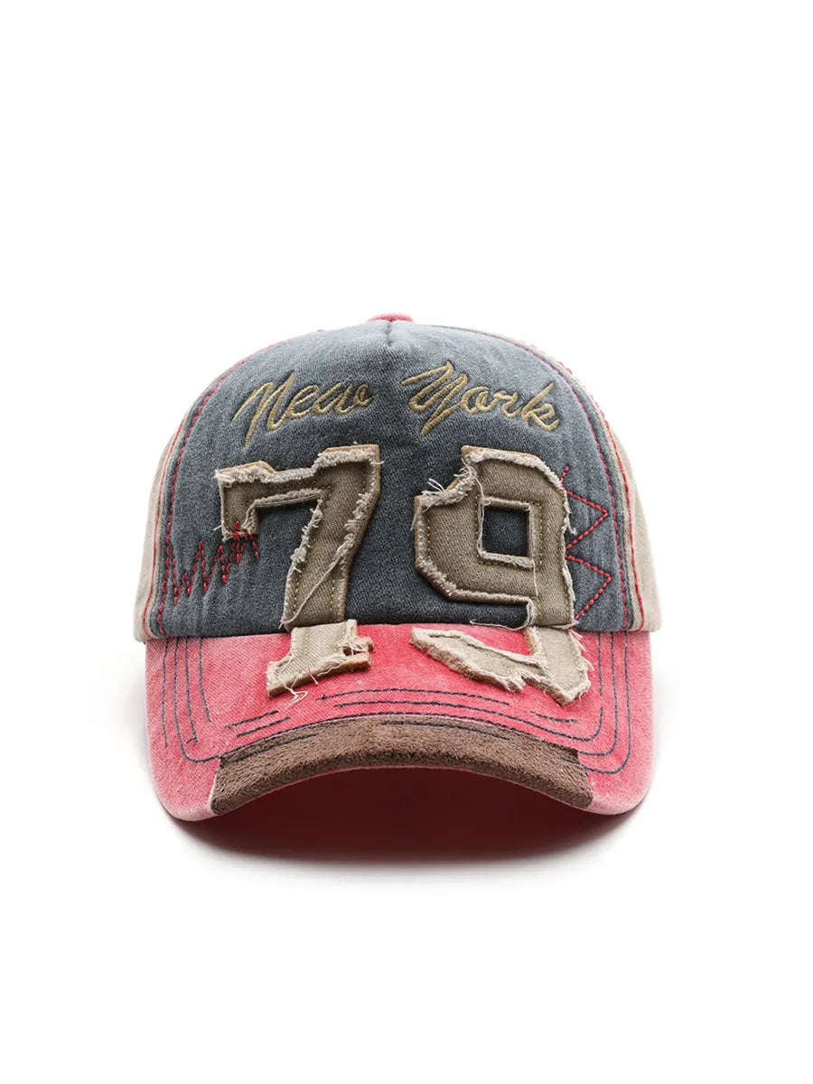 Vintage-style cap with 'New York 79' text on a white background